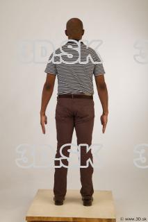 Whole body black white striped shirt brown jeans brown shoes…